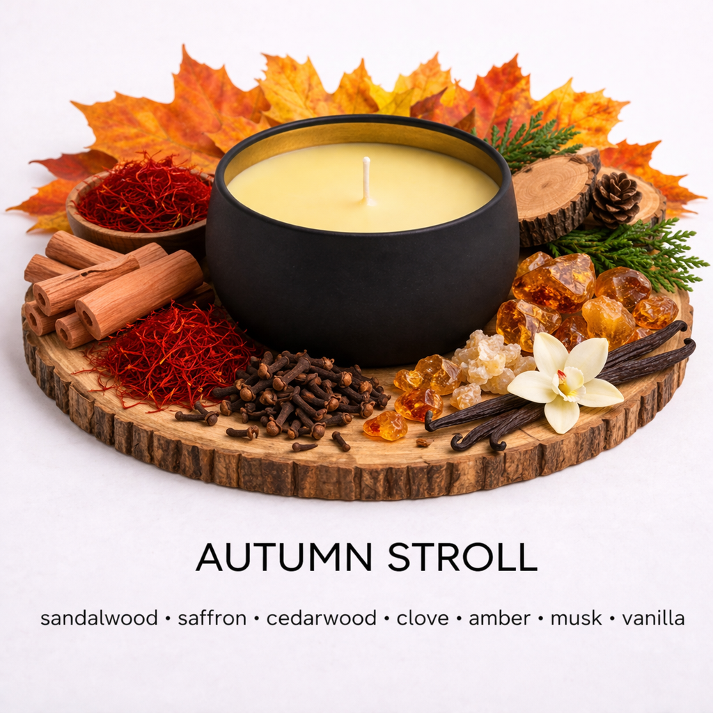 Candle labelled 'Autumn Stroll' with spices and vanilla beans on a wooden coaster. by Fair Dinkum Scents