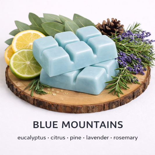 Blue Mountains soy wax melt with eucalyptus, citrus and pine fresh clean spa fragrance on wooden base