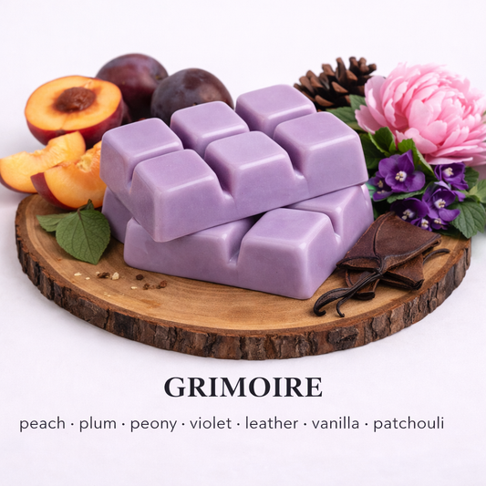 Grimoire soy wax melt with dark floral scent notes of peach, plum, violet, leather and vanilla in a moody setting by Fair Dinkum Scents