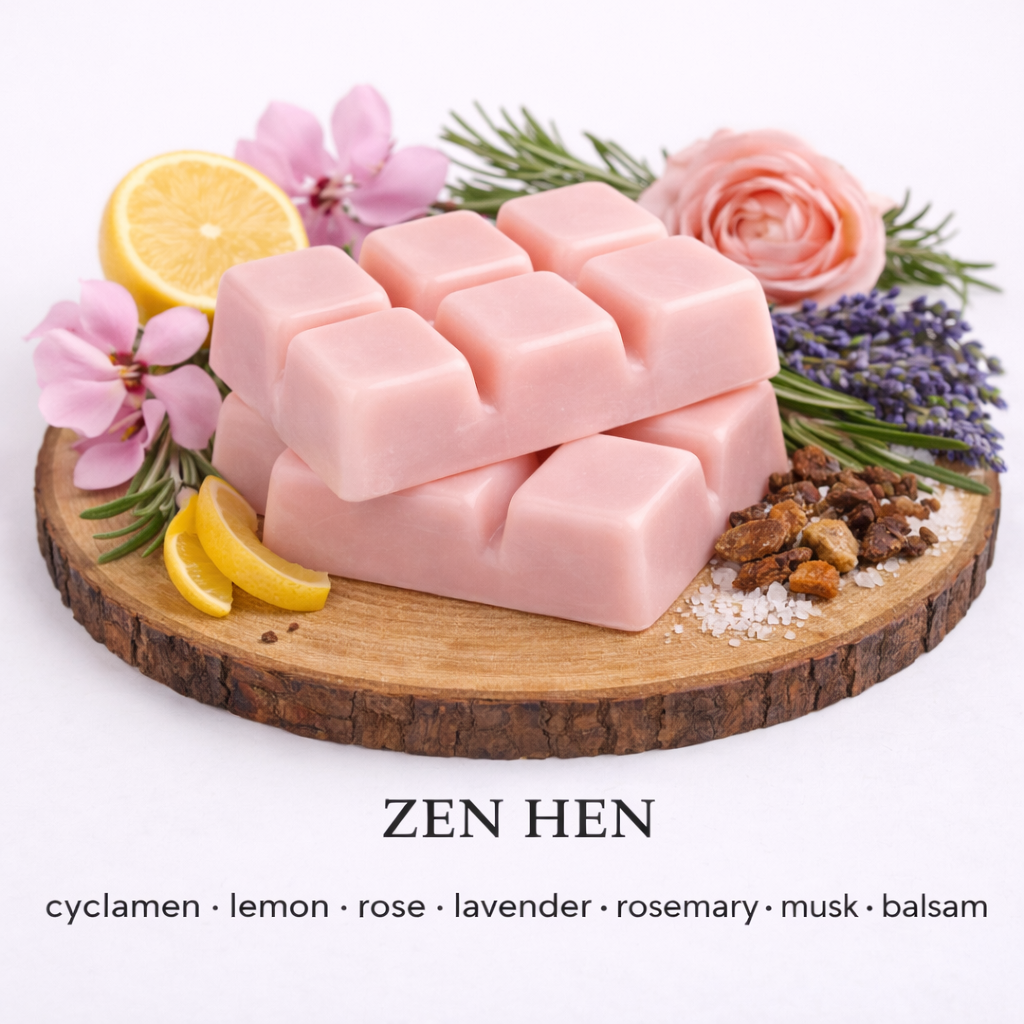 Zen Hen soy wax melt with pink wax and calming scent notes of lavender, rose, lemon and rosemary on wooden base by Fair DInkum Scents